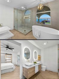 Coastal-Inspired Bathroom with Glass Shower and Waterfront View: A light-filled bathroom featuring a glass-enclosed shower, freestanding tub, and an arched window overlooking a waterfront for a tranquil ambiance.